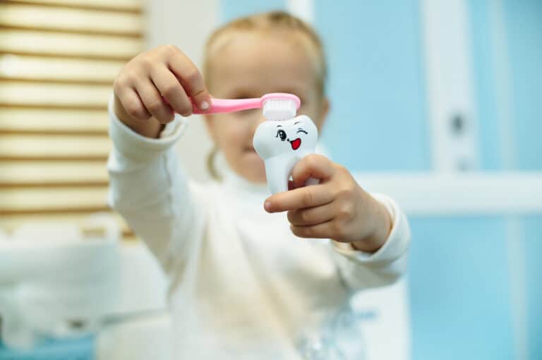 How to get toddler to brush teeth